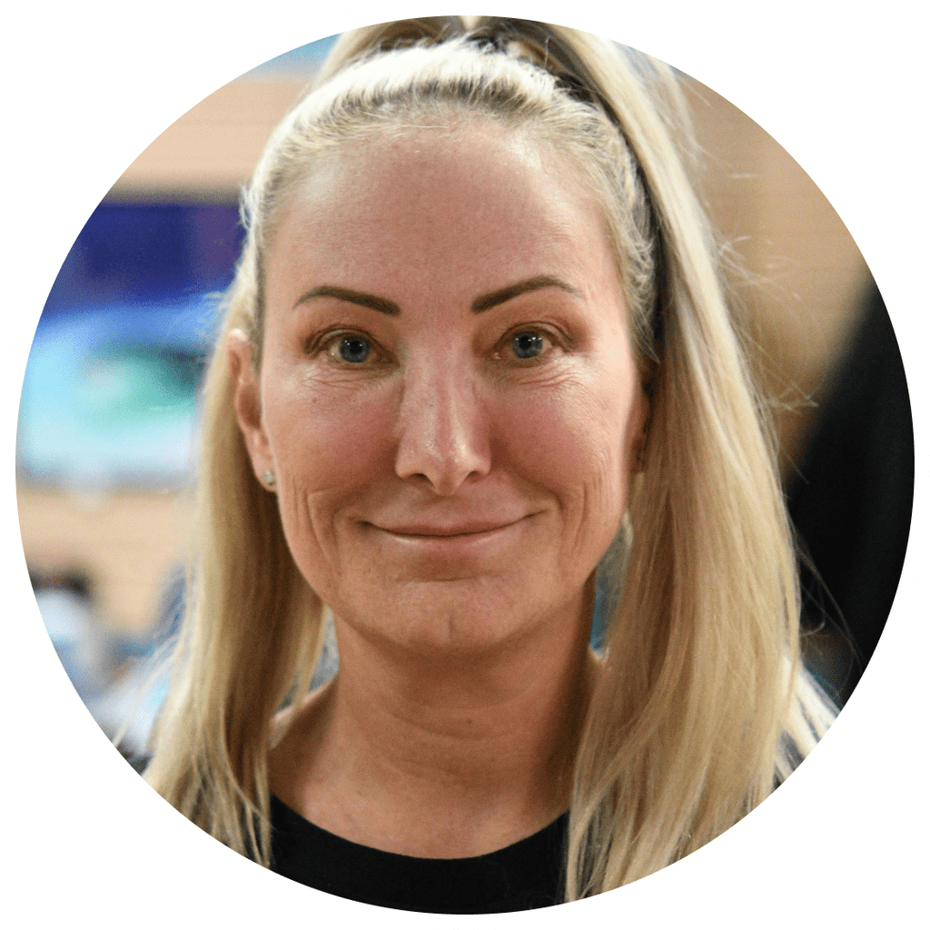 Woman with blonde hair in a round frame.