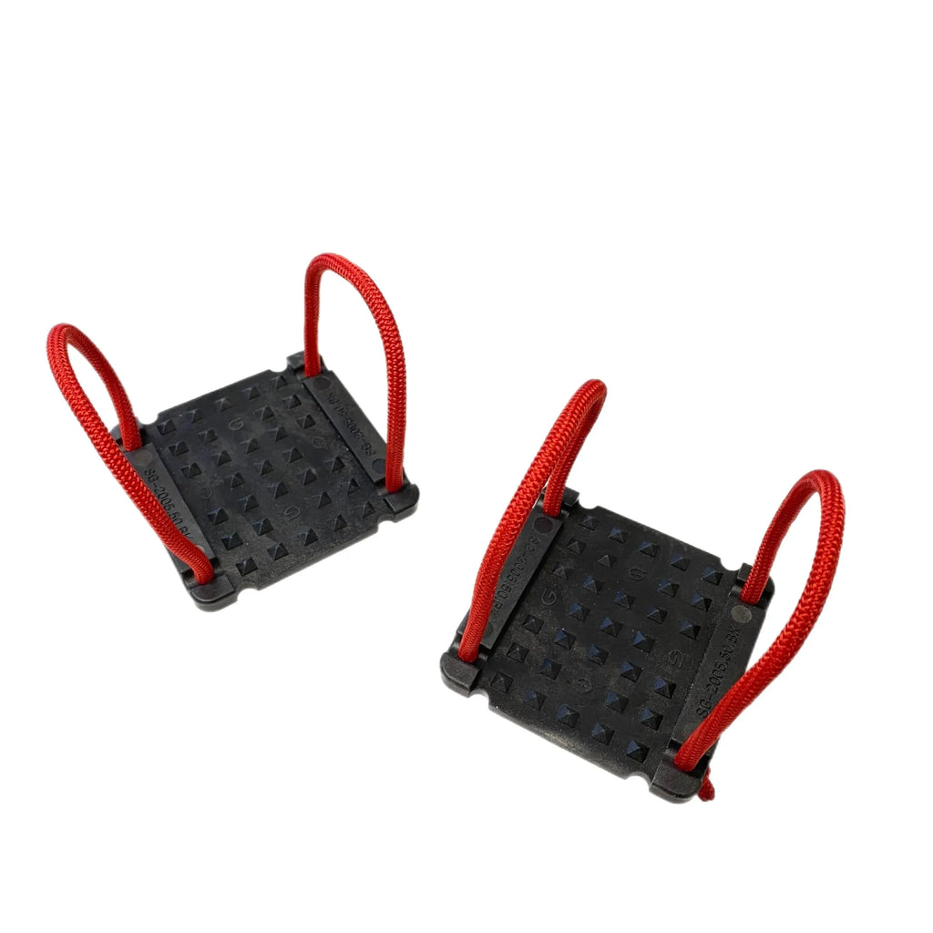 Pair of black traction pads with red rope handles