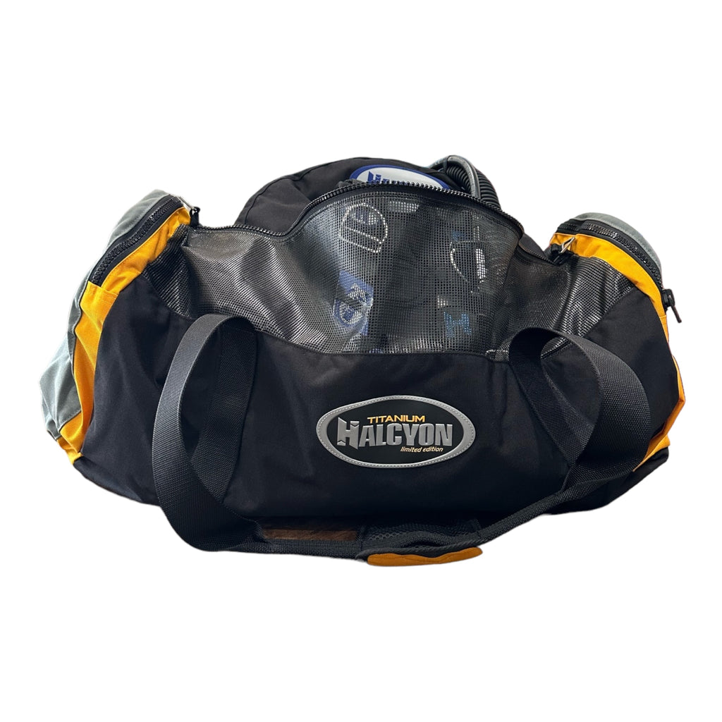 Halcyon Titanium duffel bag, open, with gear inside.