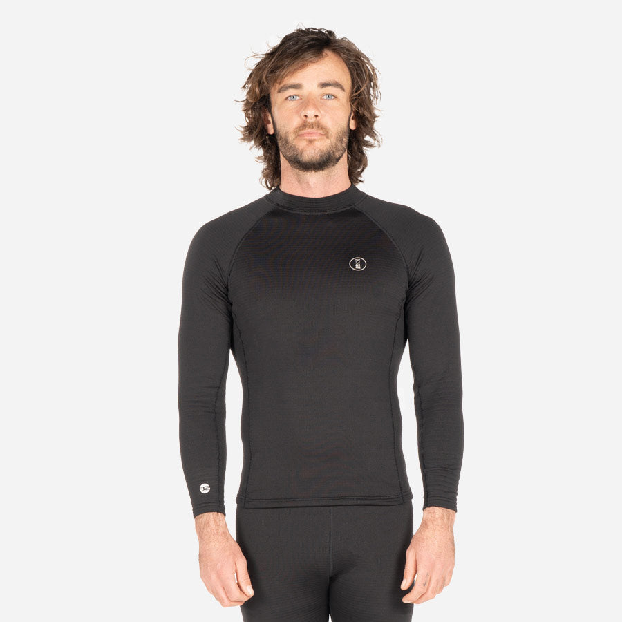 Man wearing black long sleeve top, front view