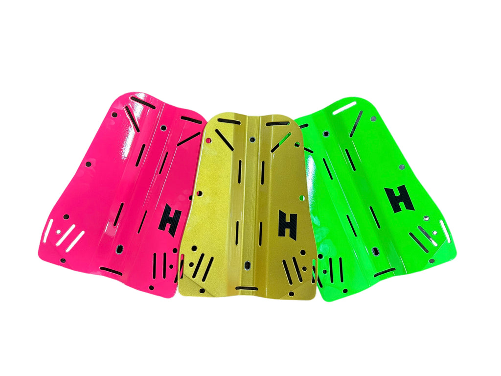 Pink, yellow, and green training aids with H logo.